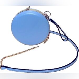 Powder blue canteen crossbody bag.